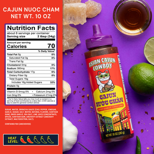 Cajun Nuoc Cham bottle with nutrition label and ingredients on a purple background